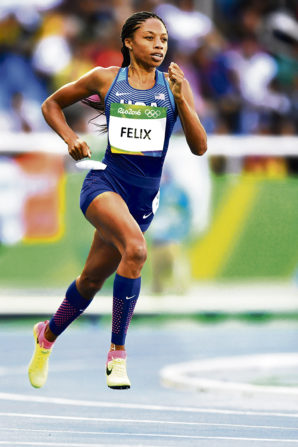 USA's Allyson Felix competes in the Women's 400m Round 1 during the athletics event at the Rio 2016 Olympic Games at the Olympic Stadium in Rio de Janeiro on August 13, 2016. / AFP / Fabrice COFFRINI - LEHTIKUVA / AFP