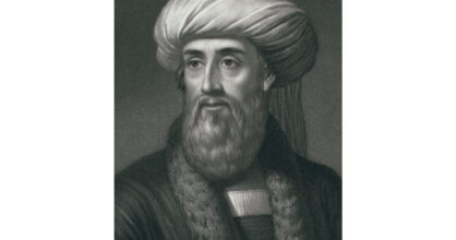 Mustavalkoinen piirros miehestä, jolla on parta ja turbaani.