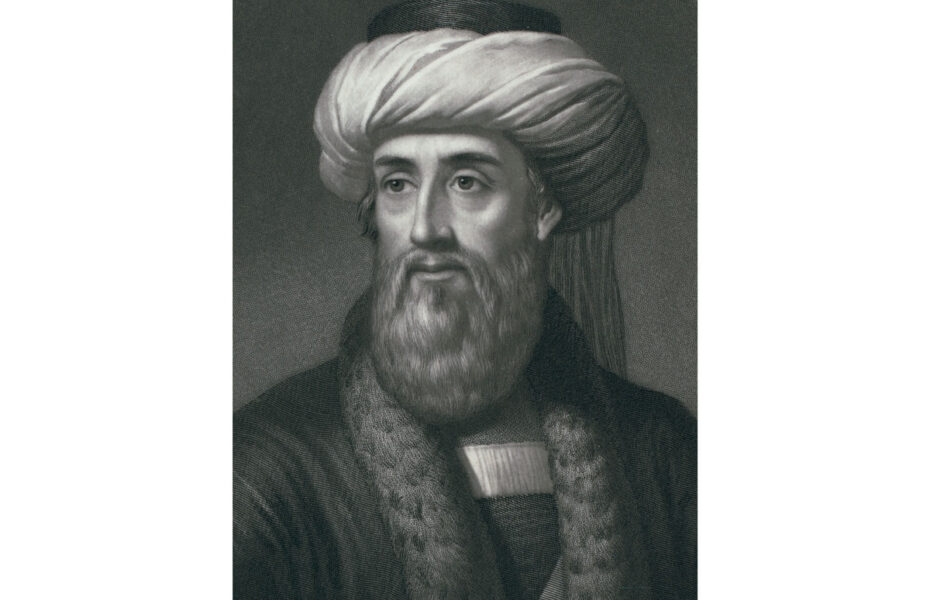 Mustavalkoinen piirros miehestä, jolla on parta ja turbaani.