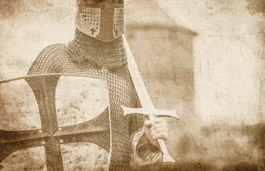 Kuvassa on ritari miekka ja kilpi kädessään.