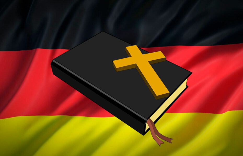 Kuvassa Raamattu ja Saksan lippu.